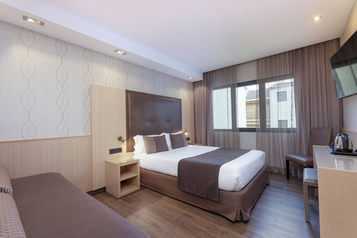 In-room safe, desk, laptop workspace, blackout curtains