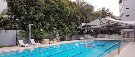 Indoor pool, outdoor pool, open 7:30 AM to 9 PM, pool loungers
