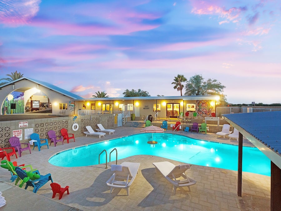 Outdoor pool, a heated pool, open 8:00 AM to 11:00 PM, free cabanas