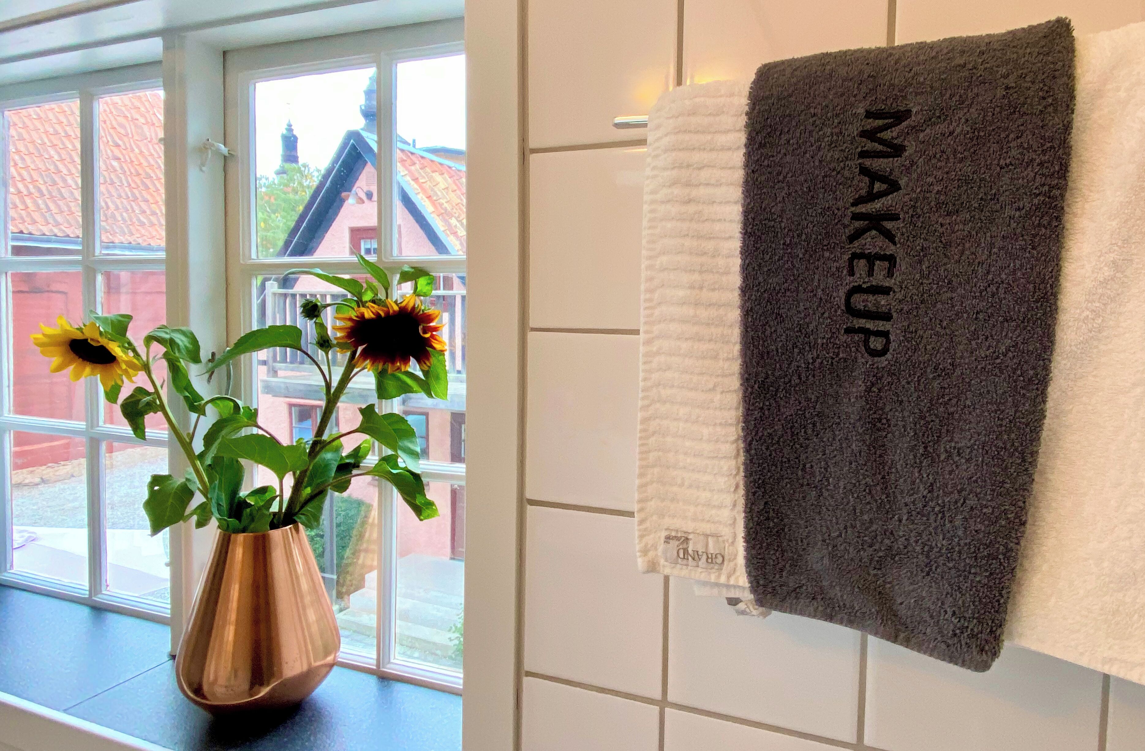 twin room | bathroom | shower, eco-friendly toiletries, hair dryer, bathrobes