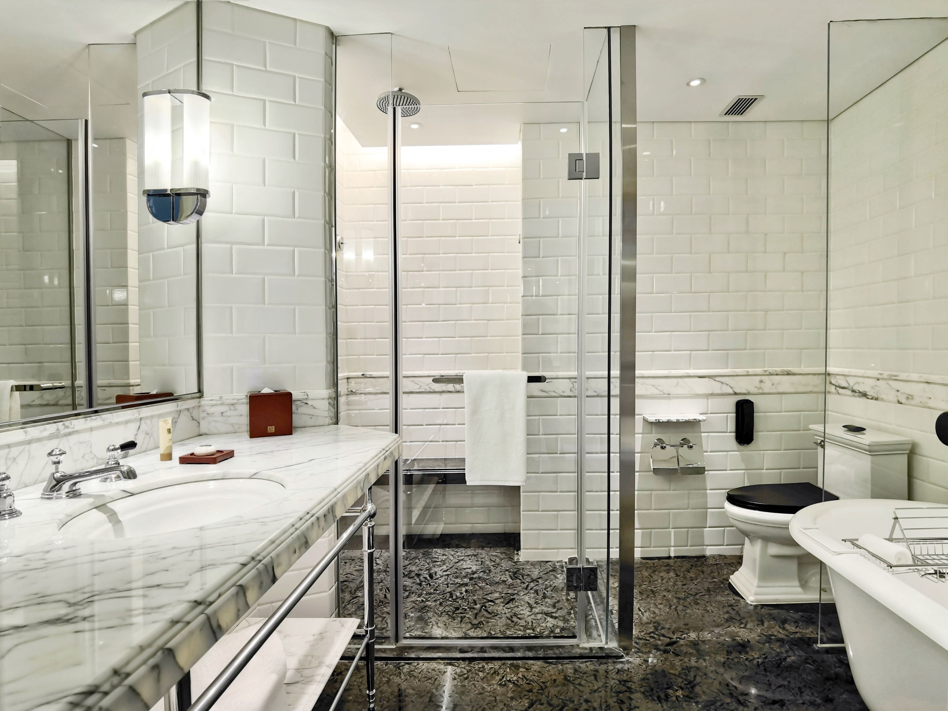 bathroom | separate bathtub and shower, rainfall showerhead, hair dryer, bathrobes