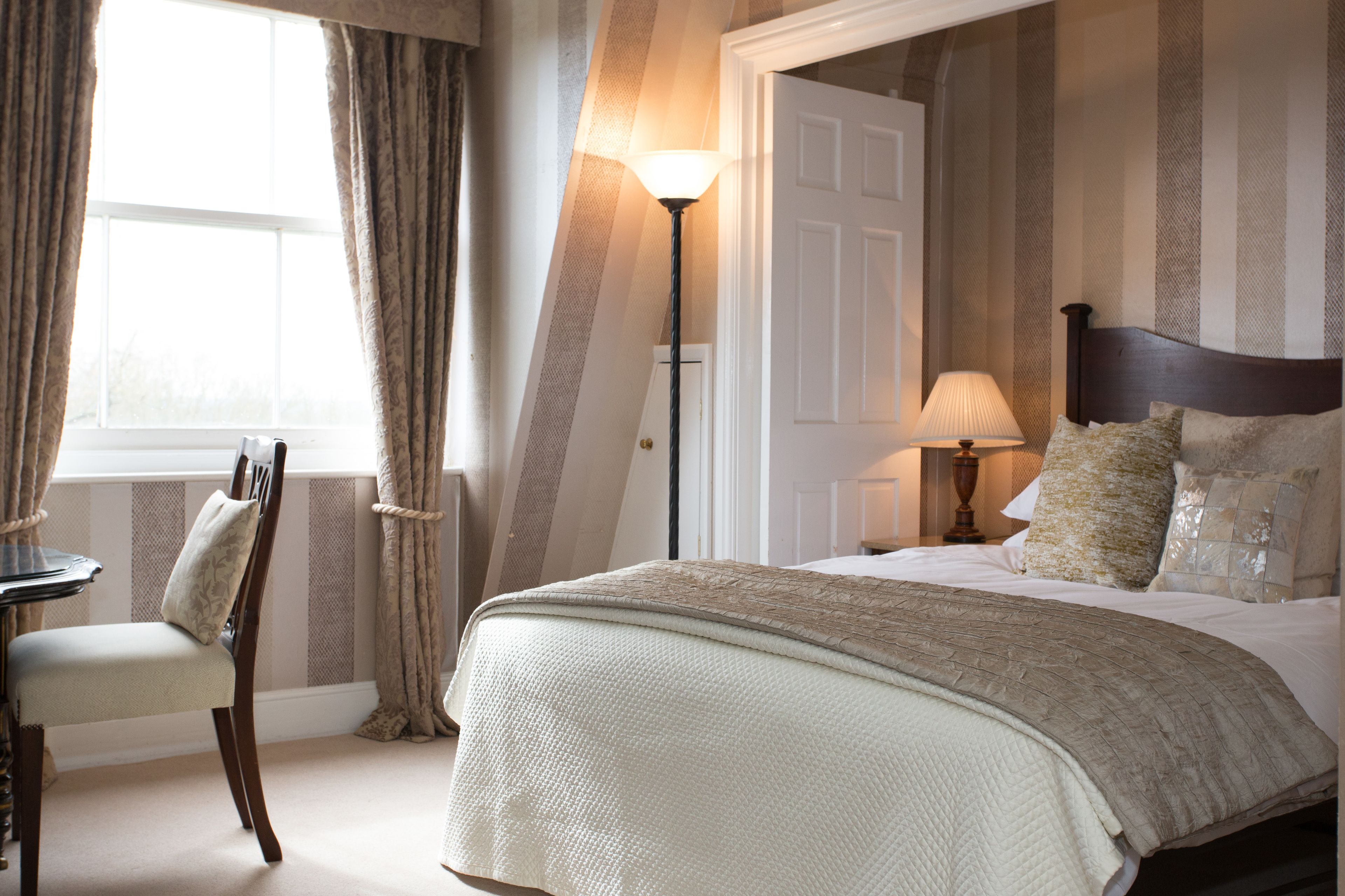 deluxe double room | egyptian cotton sheets, premium bedding, memory-foam beds, in-room safe