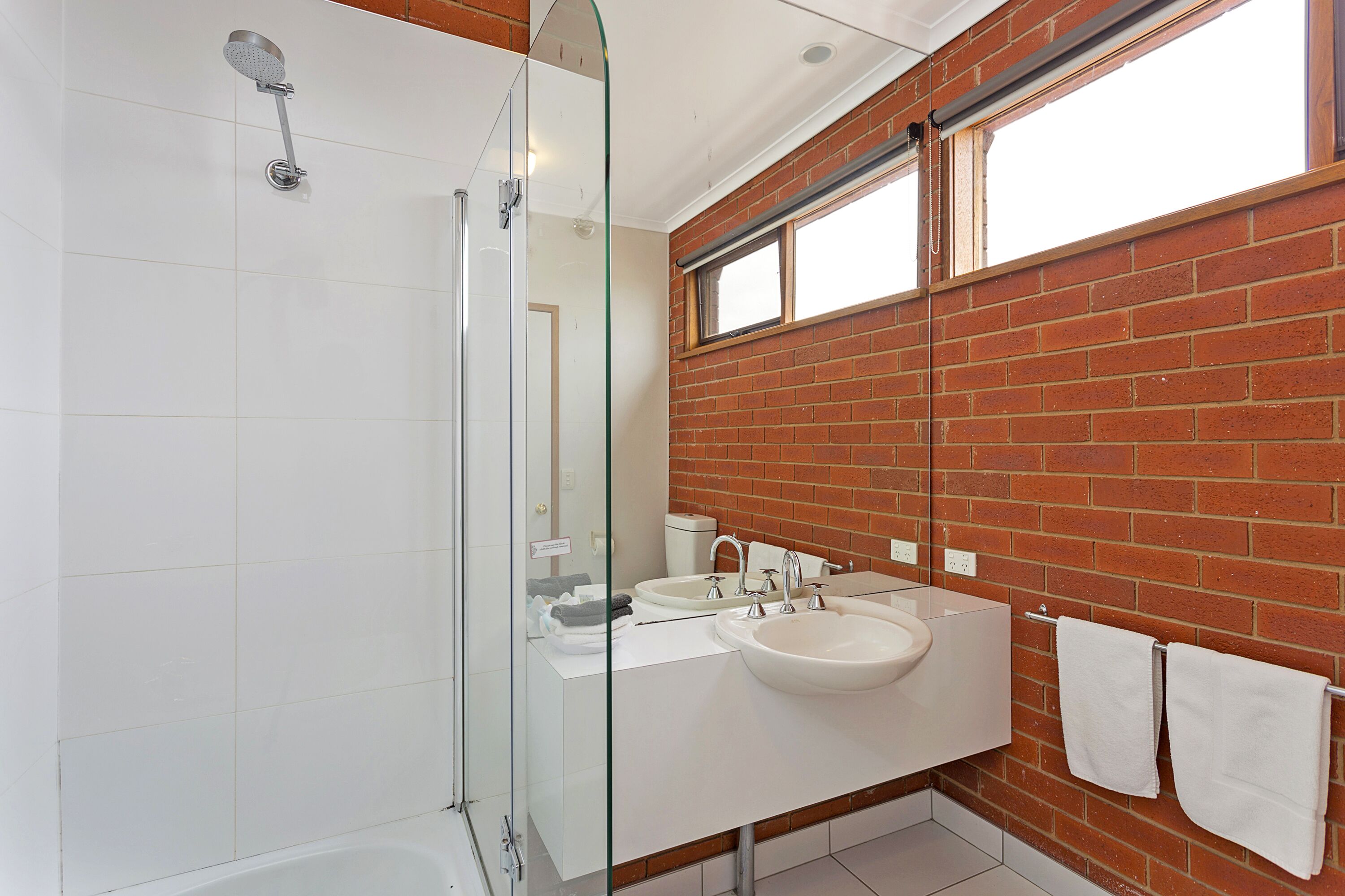 family room | bathroom | shower, free toiletries, hair dryer, towels