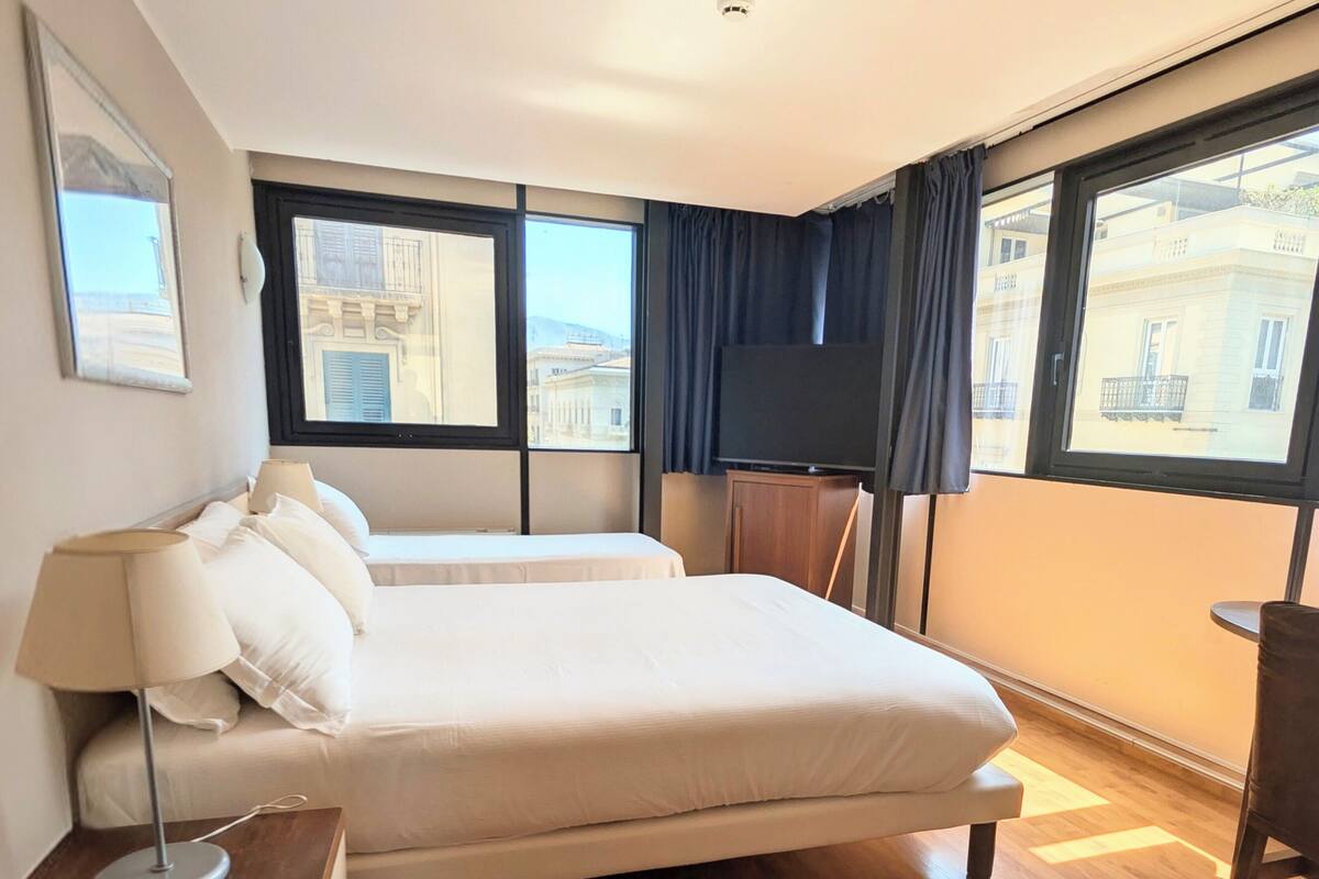 Quadruple Room | Minibar, in-room safe, blackout curtains, soundproofing