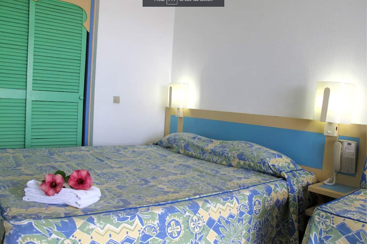 In-room safe, blackout curtains, iron/ironing board
