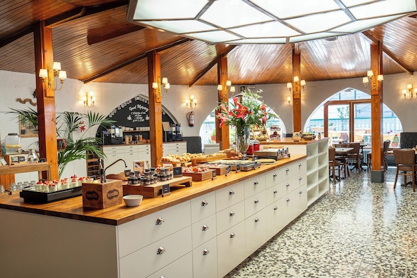 Daily buffet breakfast (EUR 18 per person)
