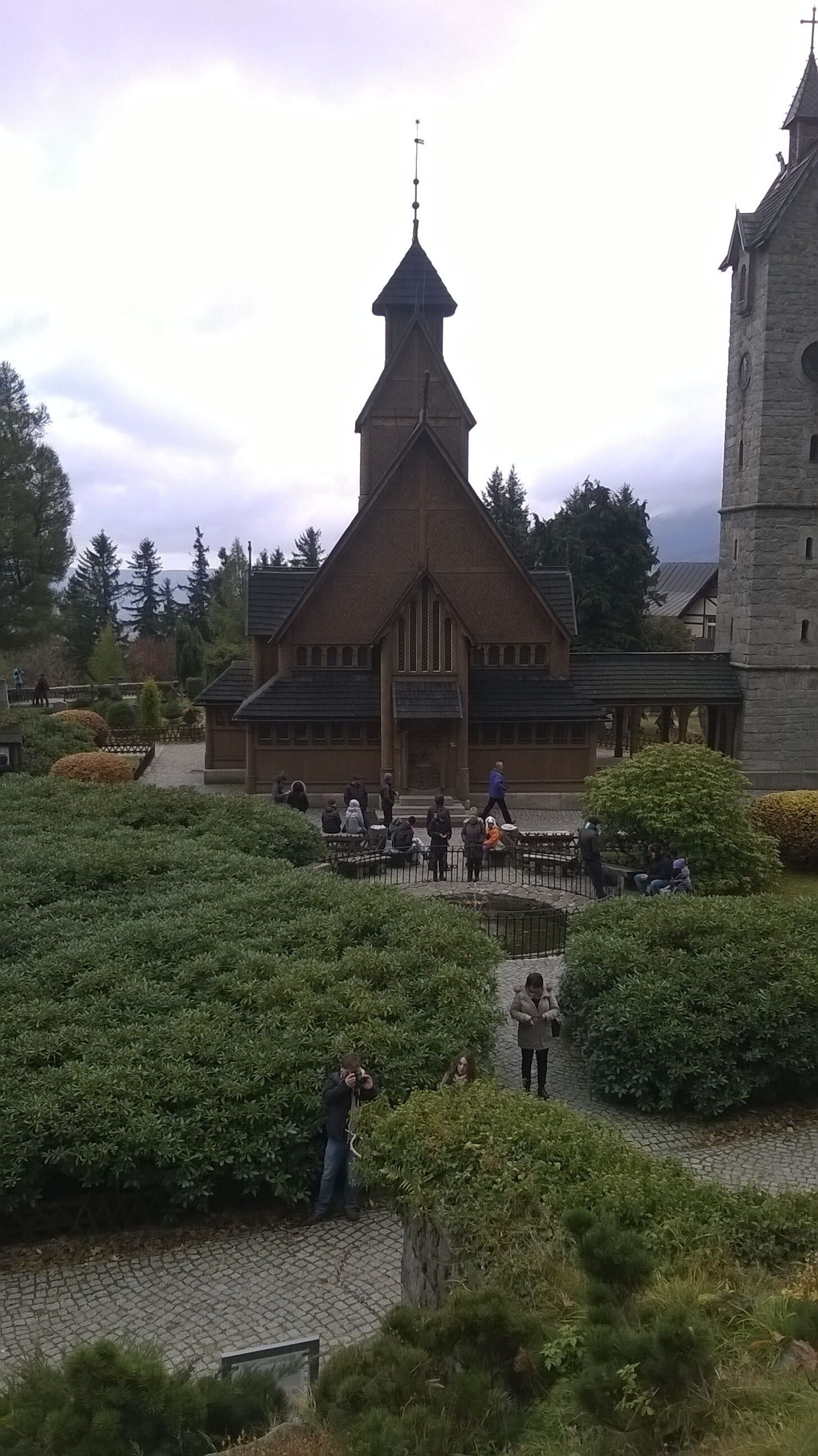 A church with a prominent tower and a bell tower.