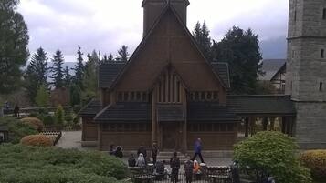 A church with a prominent tower and a bell tower.