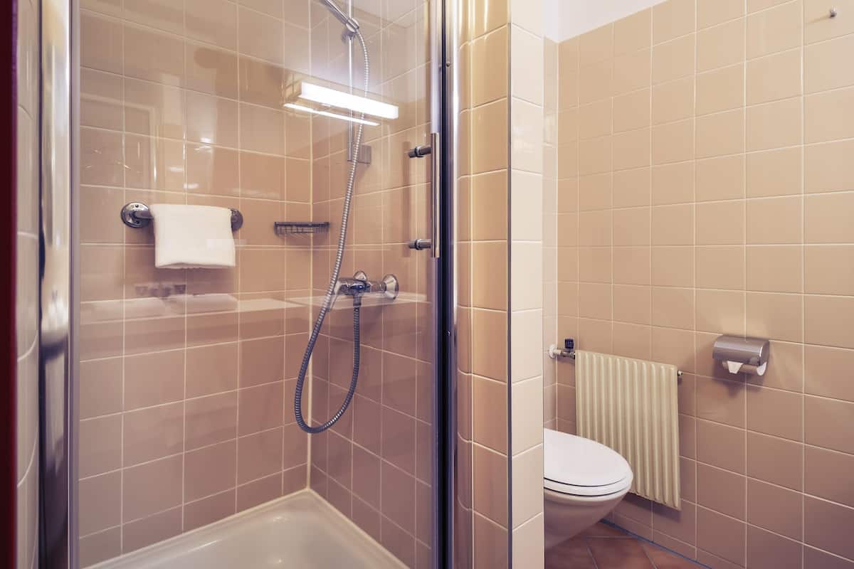 Hypo-allergenic bedding, desk, laptop workspace, blackout curtains