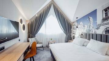 Hypo-allergenic bedding, desk, laptop workspace, blackout curtains
