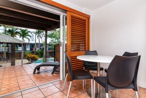Pool View Studio Plus | Living area | 32-inch LCD TV with digital channels, TV, streaming services