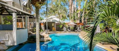 Outdoor pool, open 7:00 AM to 9:00 PM, free pool cabanas, pool umbrellas