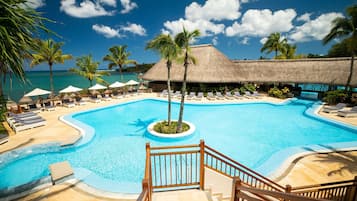 Outdoor pool, an infinity pool, pool umbrellas, sun loungers