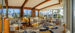 Breakfast, lunch, dinner served; international cuisine, beach views 