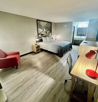 Habitación Deluxe, 1 cama de matrimonio grande, no fumadores | Tabla de planchar con plancha, wifi gratis, ropa de cama y despertador