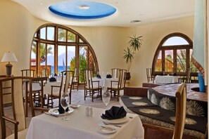 Breakfast, lunch, dinner served; beach views