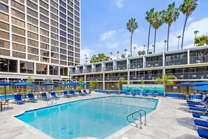 Outdoor pool, open 8:00 AM to 10:00 PM, pool umbrellas, pool loungers