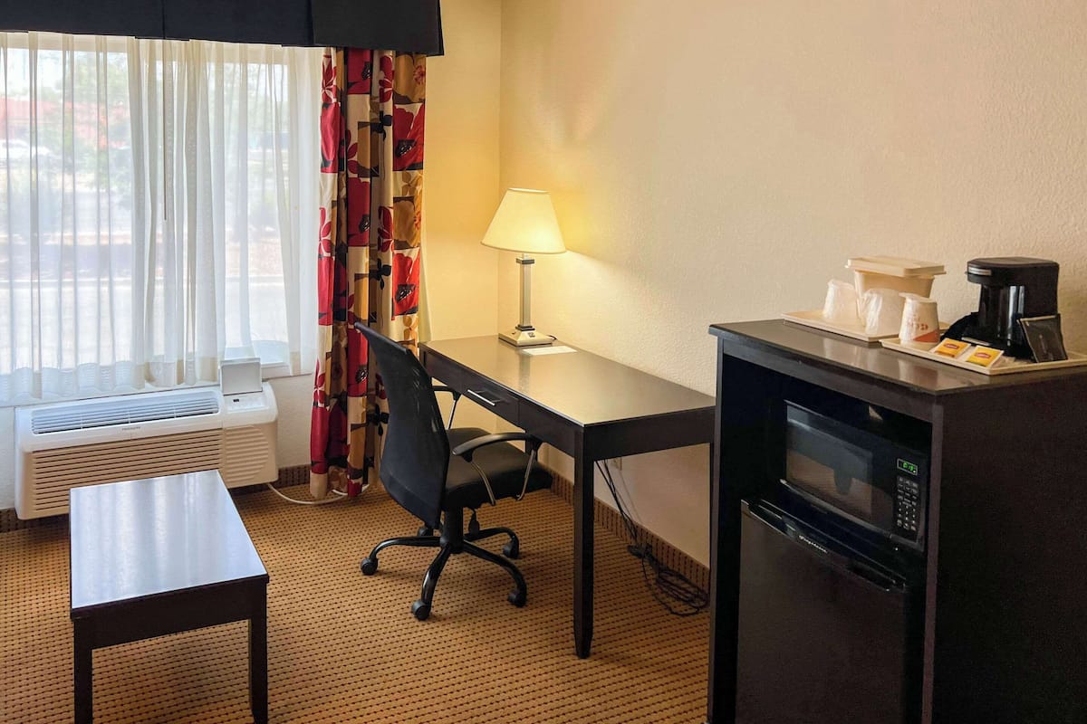 suite, 1 king bed, non smoking | desk, iron/ironing board, free cots/infant beds, rollaway beds