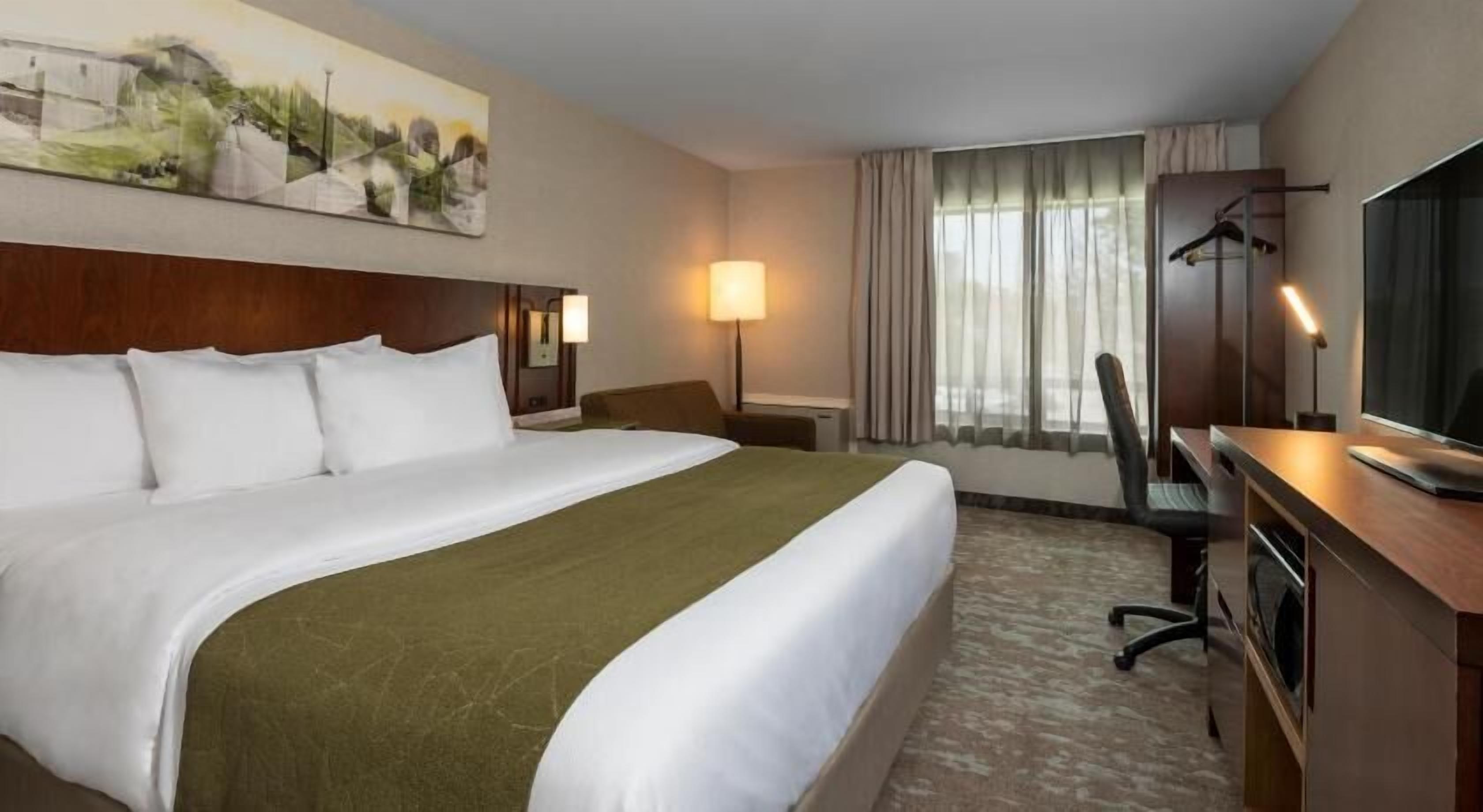 Premium bedding, pillow-top beds, desk, blackout curtains