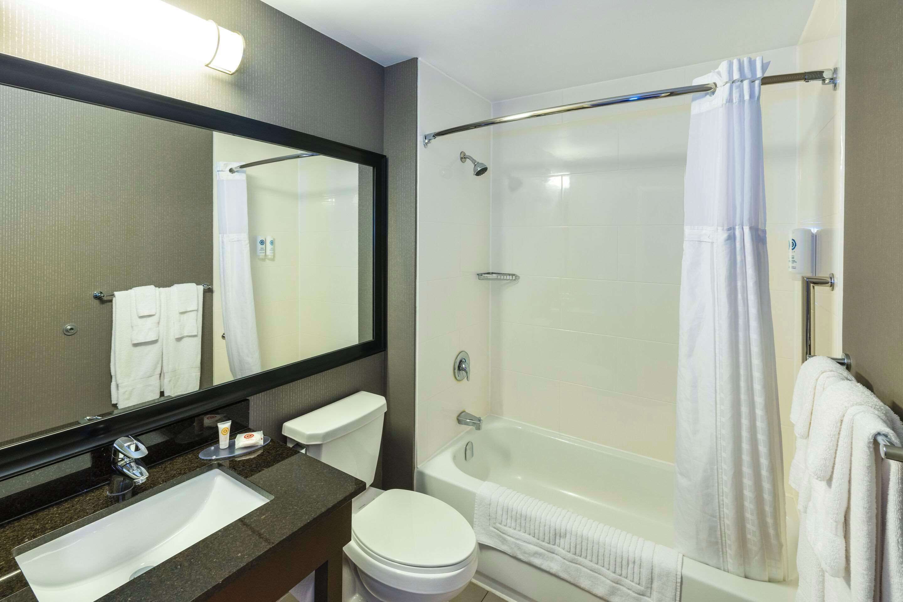 premium bedding, pillow-top beds, desk, blackout curtains