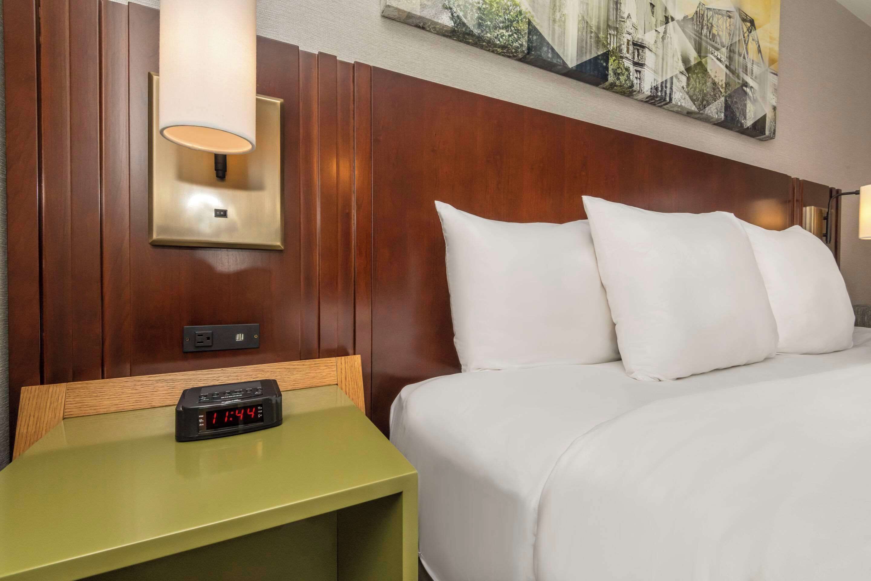 premium bedding, pillow-top beds, desk, blackout curtains