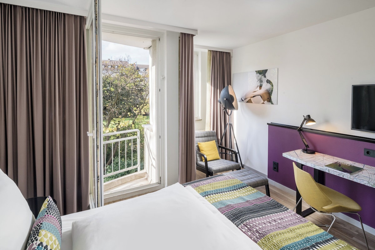 Hypoallergeen beddengoed, een minibar, een kluis op de kamer, een bureau