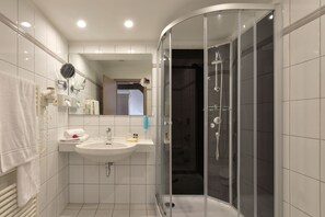 Shower, free toiletries, hair dryer, towels