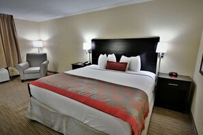 Premium bedding, desk, iron/ironing board, free cribs/infant beds - Ramada Hotel & Conference Center by Wyndham Jacksonville (Jacksonville)