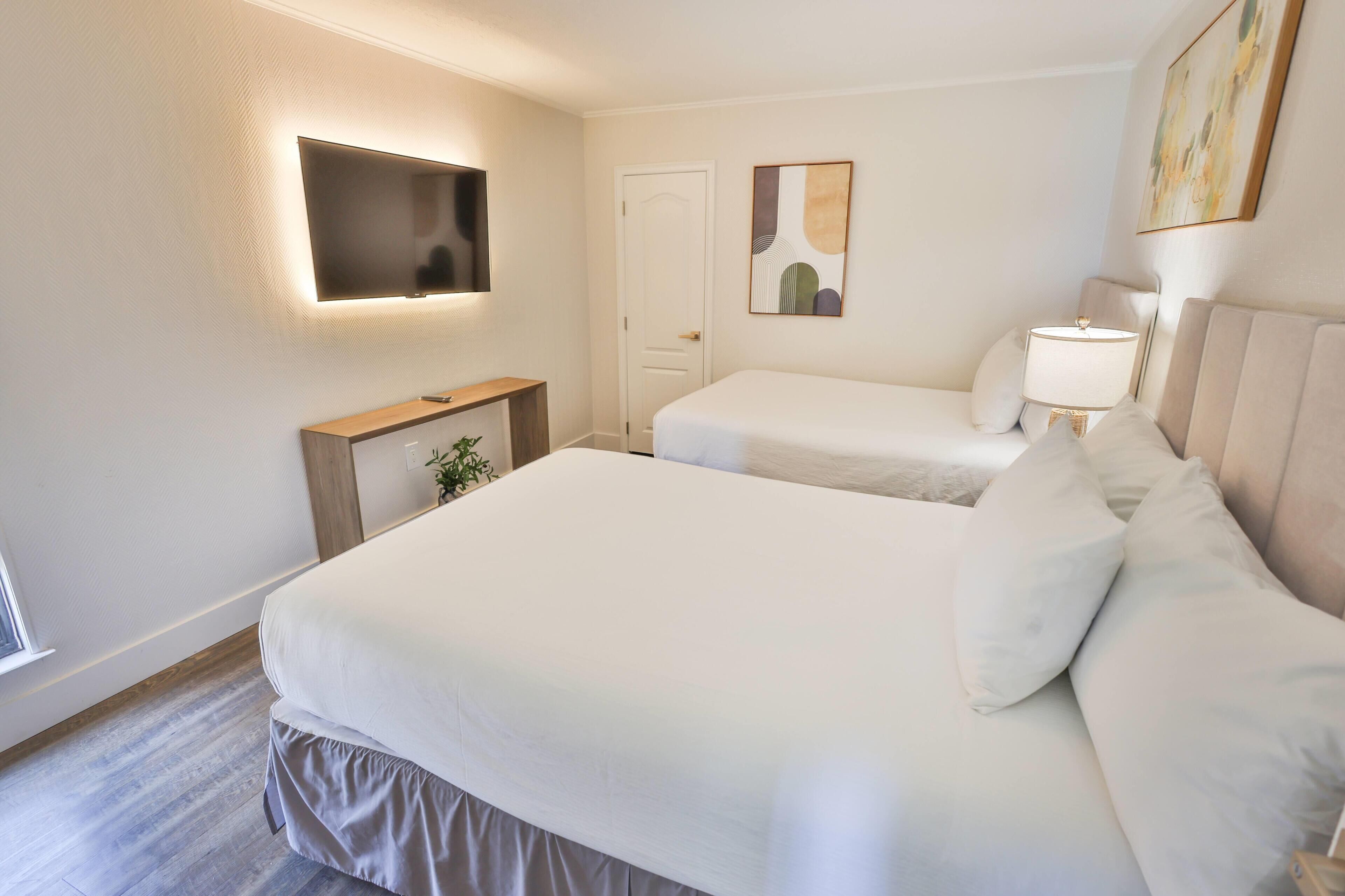 Chambre, 2 grands lits (Gulf View) | Fer et planche à repasser, lits bébé (gratuits), Wi-Fi gratuit