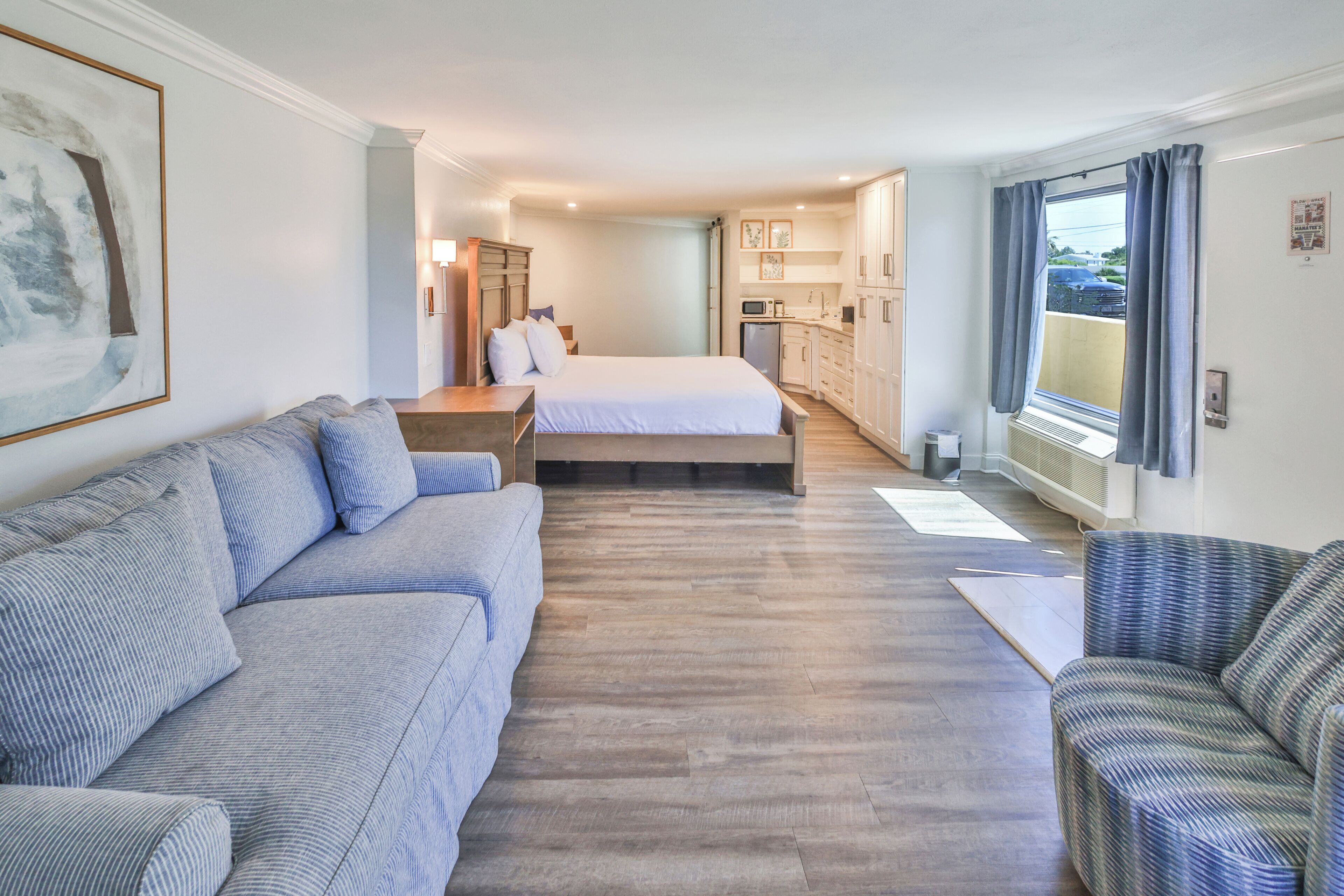 Habitación ejecutiva, 1 cama King size (Boardwalk) | Tabla de planchar con plancha, cunas gratuitas y wifi gratis 