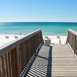 On the beach, white sand, sun-loungers, beach umbrellas