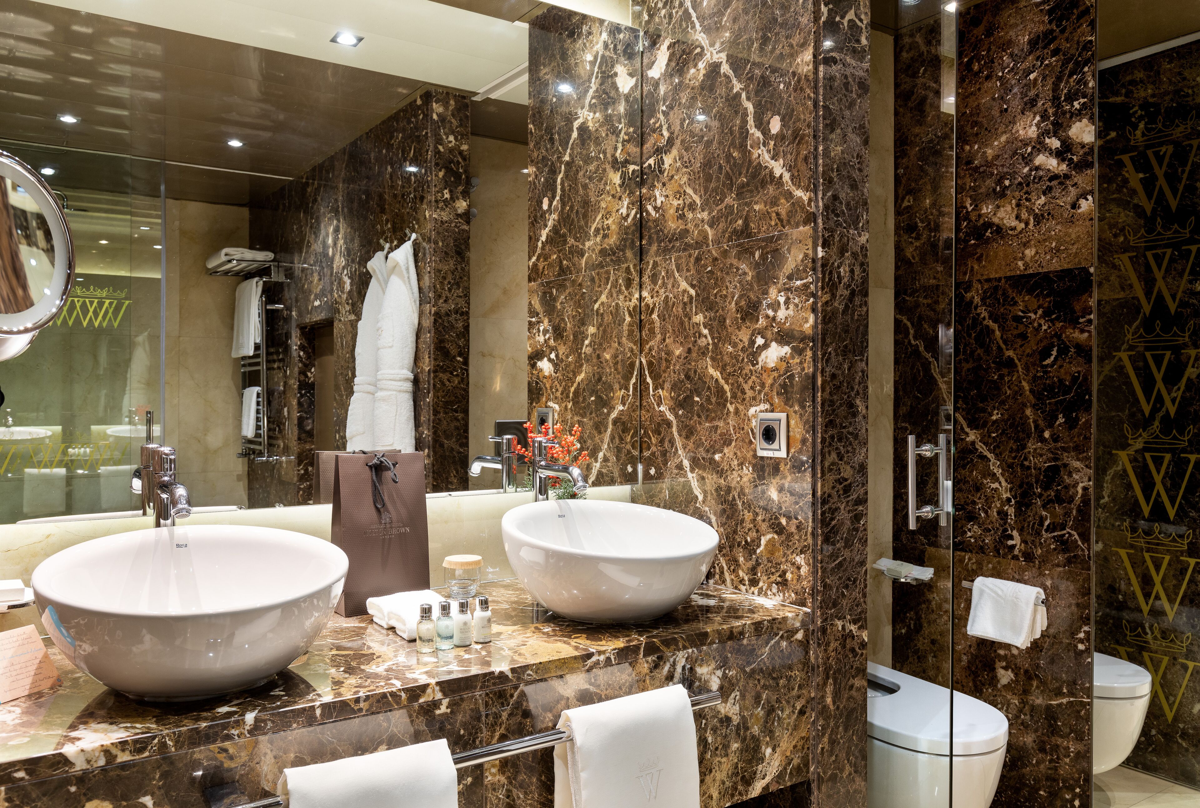 suite courtyard terrace "the wellington club" access | bathroom | designer toiletries, hair dryer, bathrobes, slippers