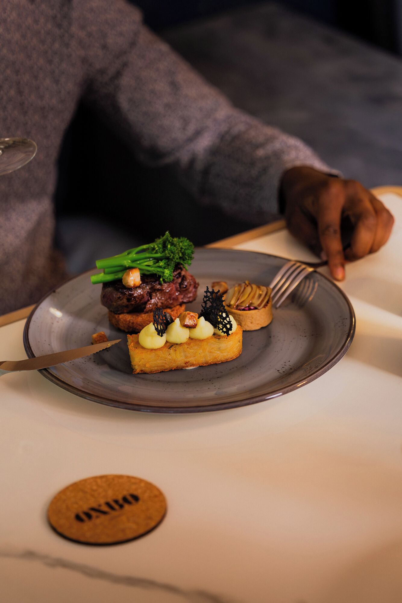 A plate with food and a fork.