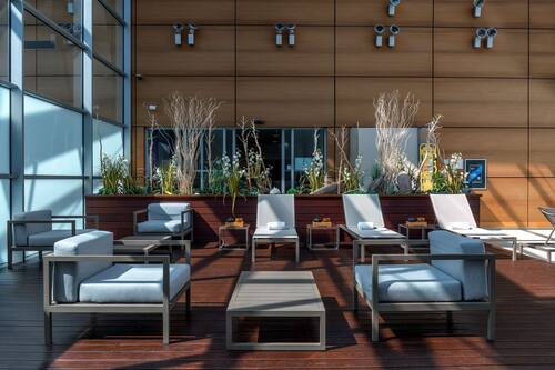 Indoor pool, open 9:00 AM to 9:00 PM, pool loungers