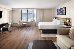 Suite junior, 1 cama de matrimonio grande con sofá cama, vistas al puerto | Ropa de cama de alta calidad y colchones con acolchado adicional