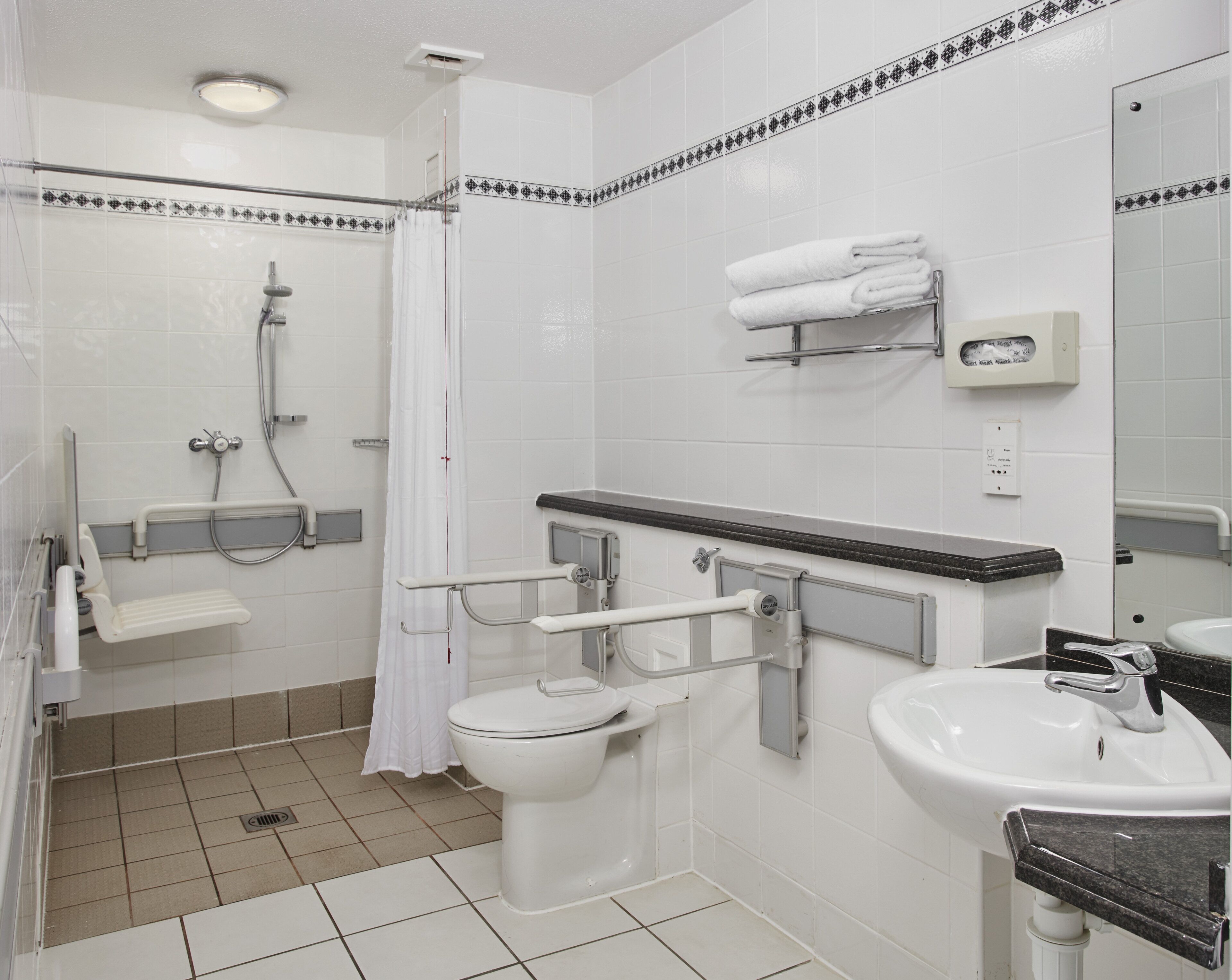combined shower/bathtub, free toiletries, hair dryer, towels