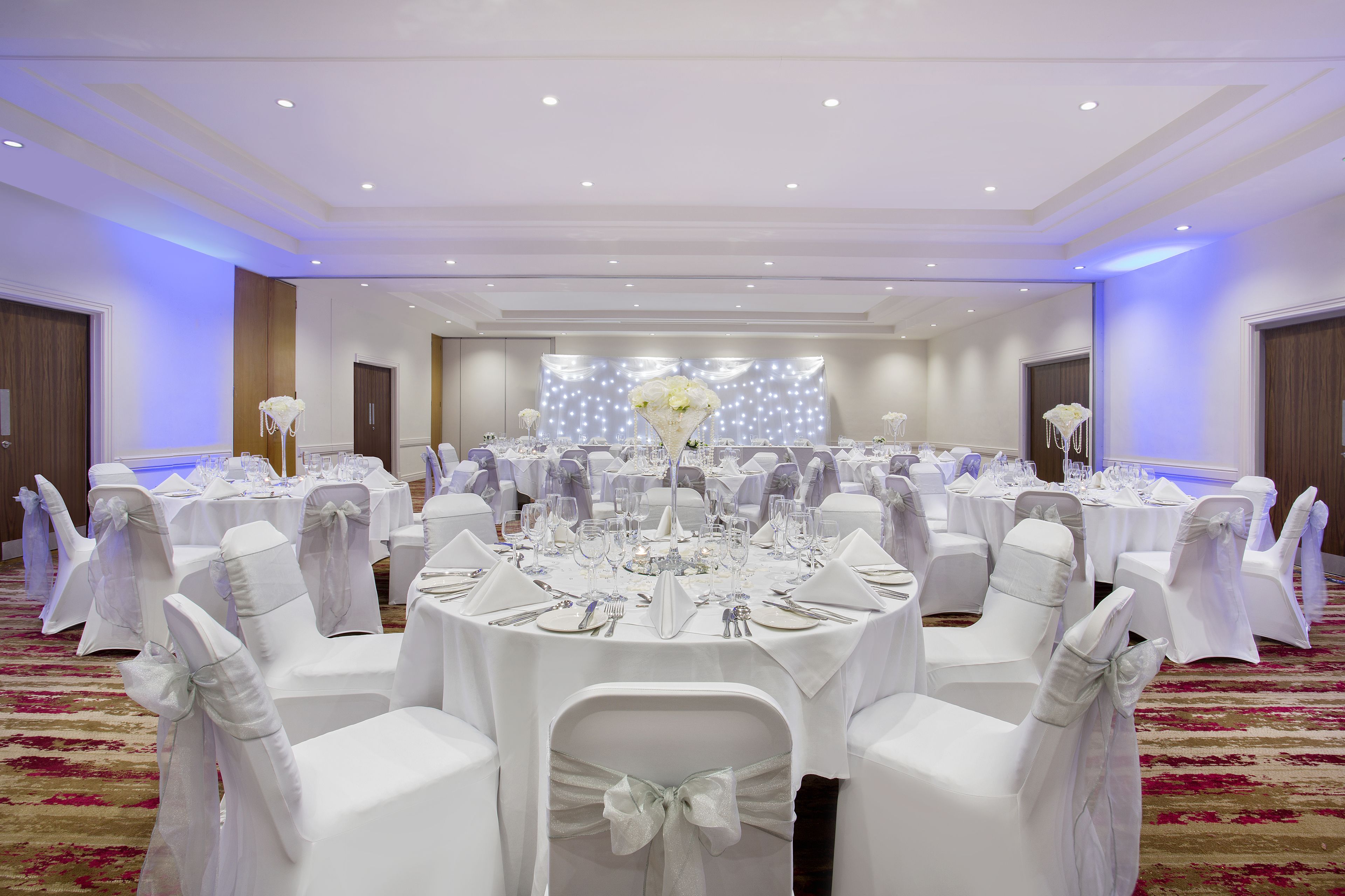 Premium bedding, desk, laptop workspace, soundproofing