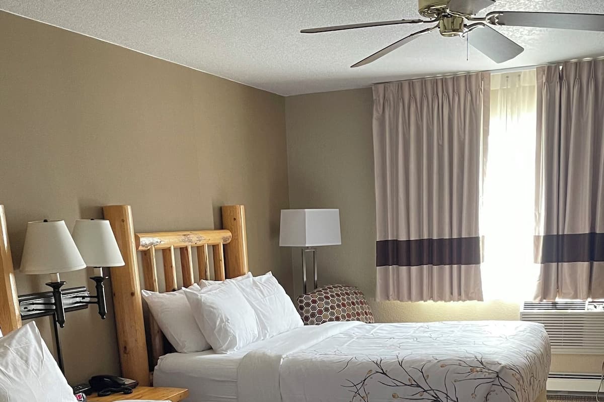 Standard Room, 2 Queen Beds | Blackout curtains, iron/ironing board, free WiFi, bed sheets