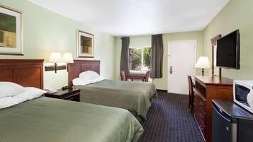 Tallelokero huoneessa, työpöytä, silitysrauta/-lauta