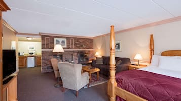 Suite, 1 grand lit, non-fumeur, foyer (Jettted Tub) | Coffre-fort, fer et planche à repasser, lit d’appoint (gratuit)