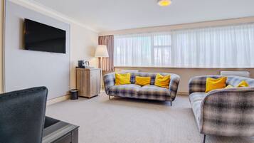Junior Suite | Desk, iron/ironing board, free cots/infant beds, rollaway beds