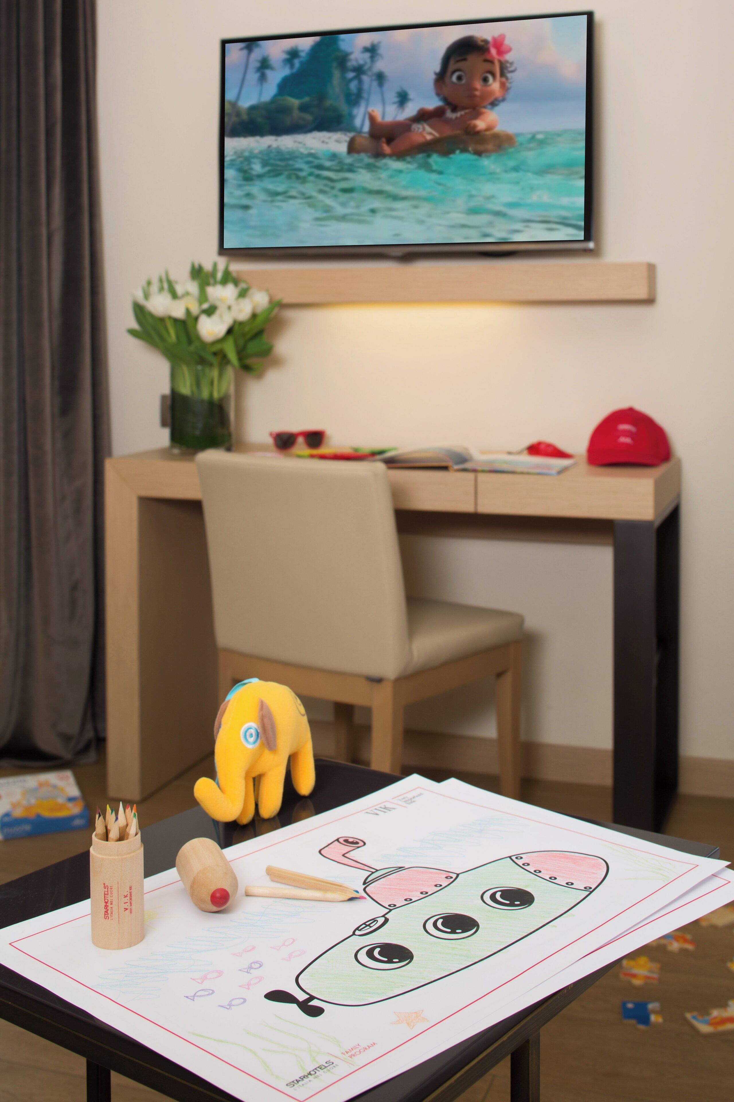 family room | 1 bedroom, minibar, in-room safe, desk