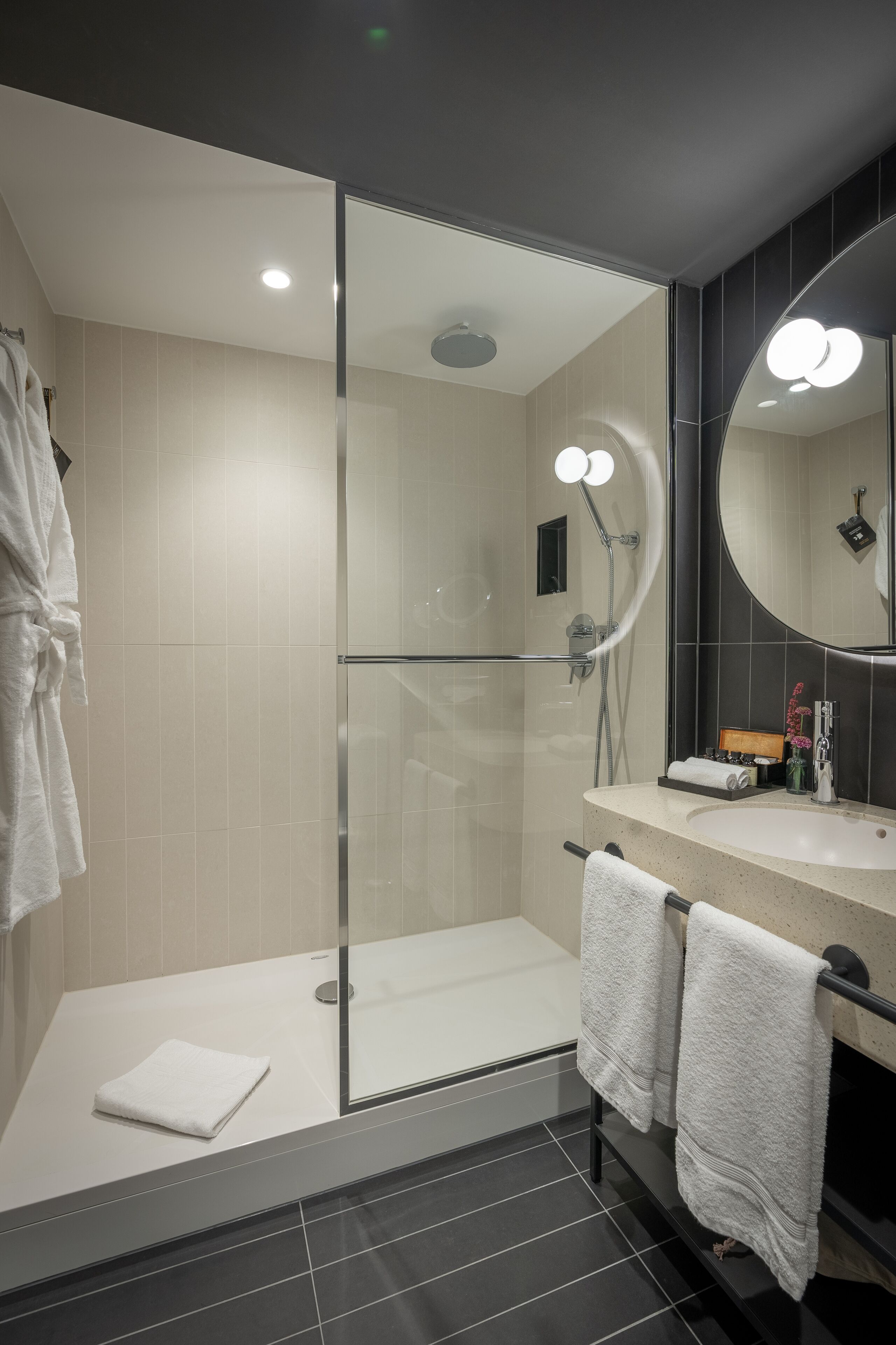 designer toiletries, hair dryer, towels, soap