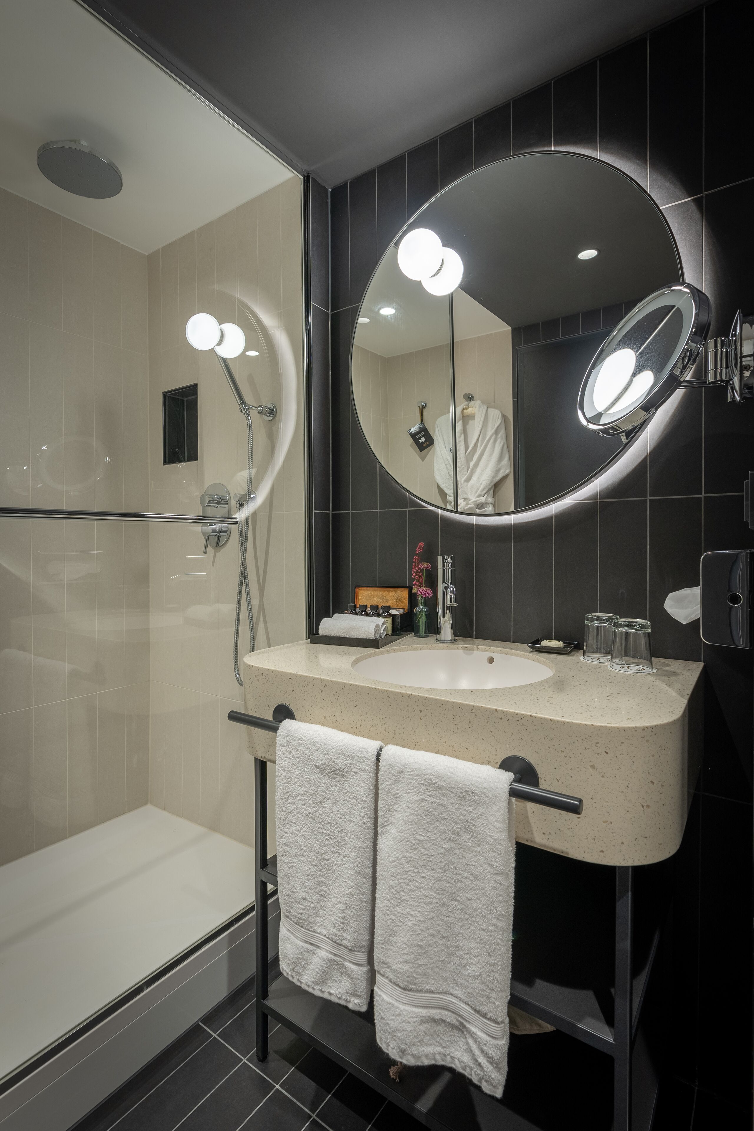 designer toiletries, hair dryer, towels, soap