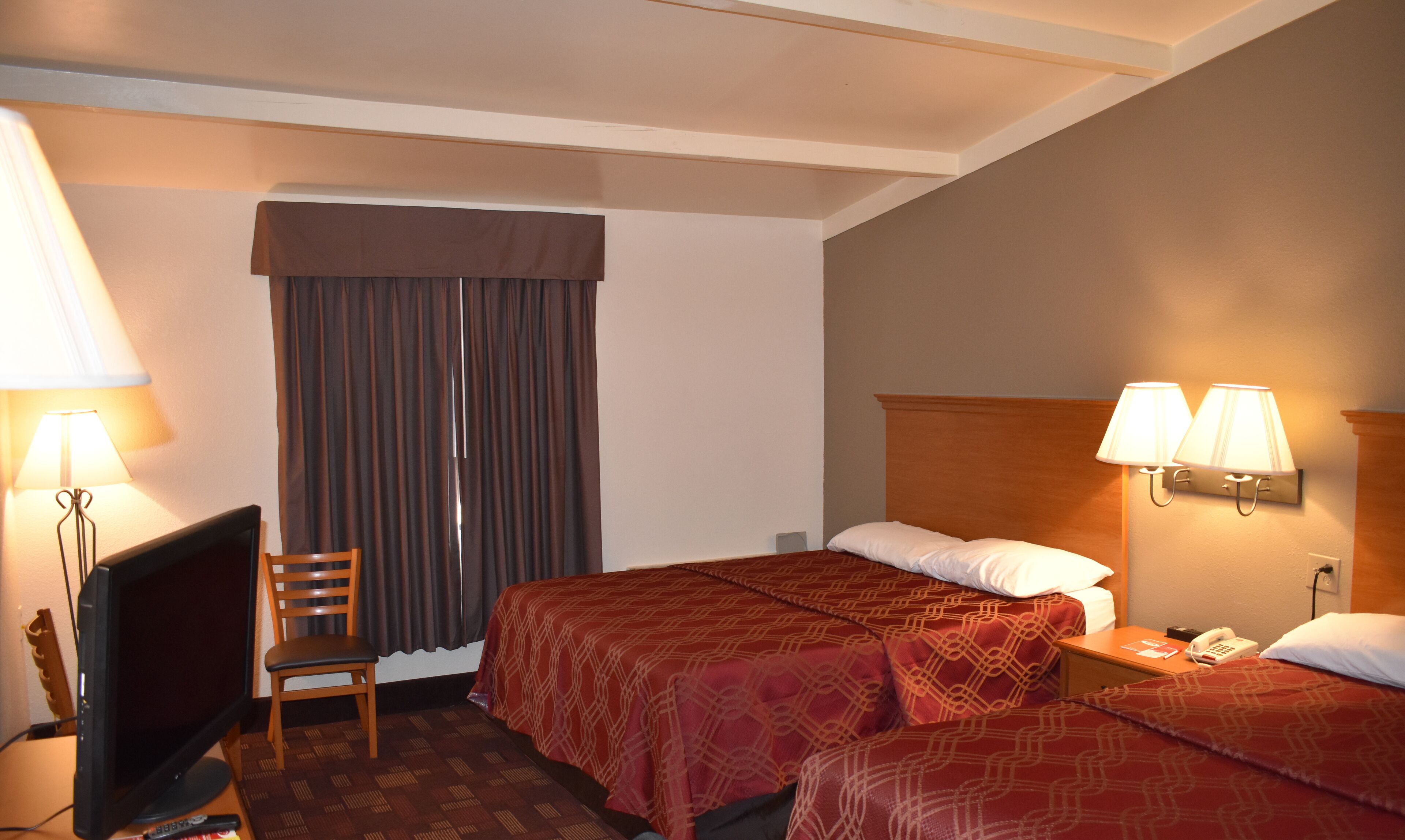 Economy Double Room, Accessible | Individually decorated, individually furnished, desk, blackout drapes