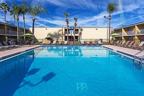 3 outdoor pools, open 9:00 AM to midnight, pool umbrellas, pool loungers