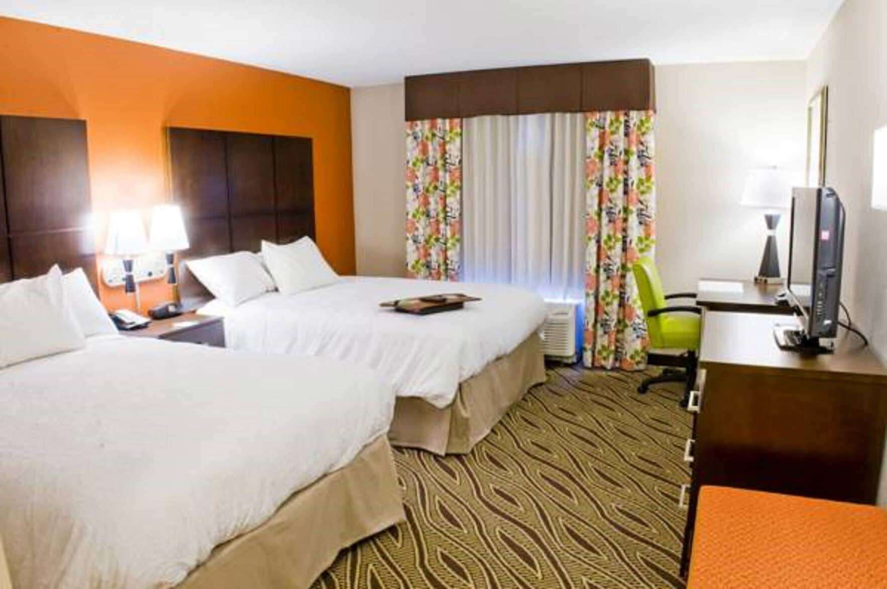 Premium bedding, pillowtop beds, desk, laptop workspace