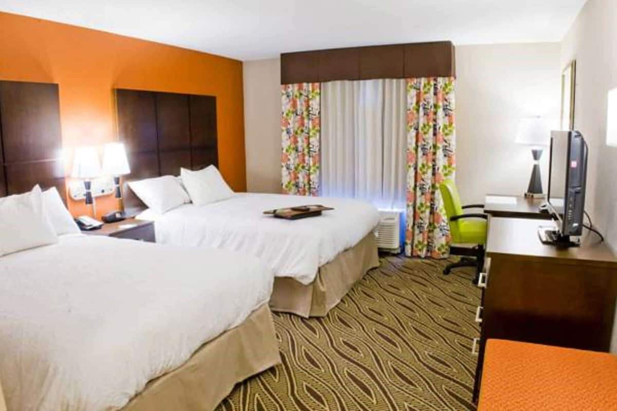 Premium bedding, pillowtop beds, desk, laptop workspace