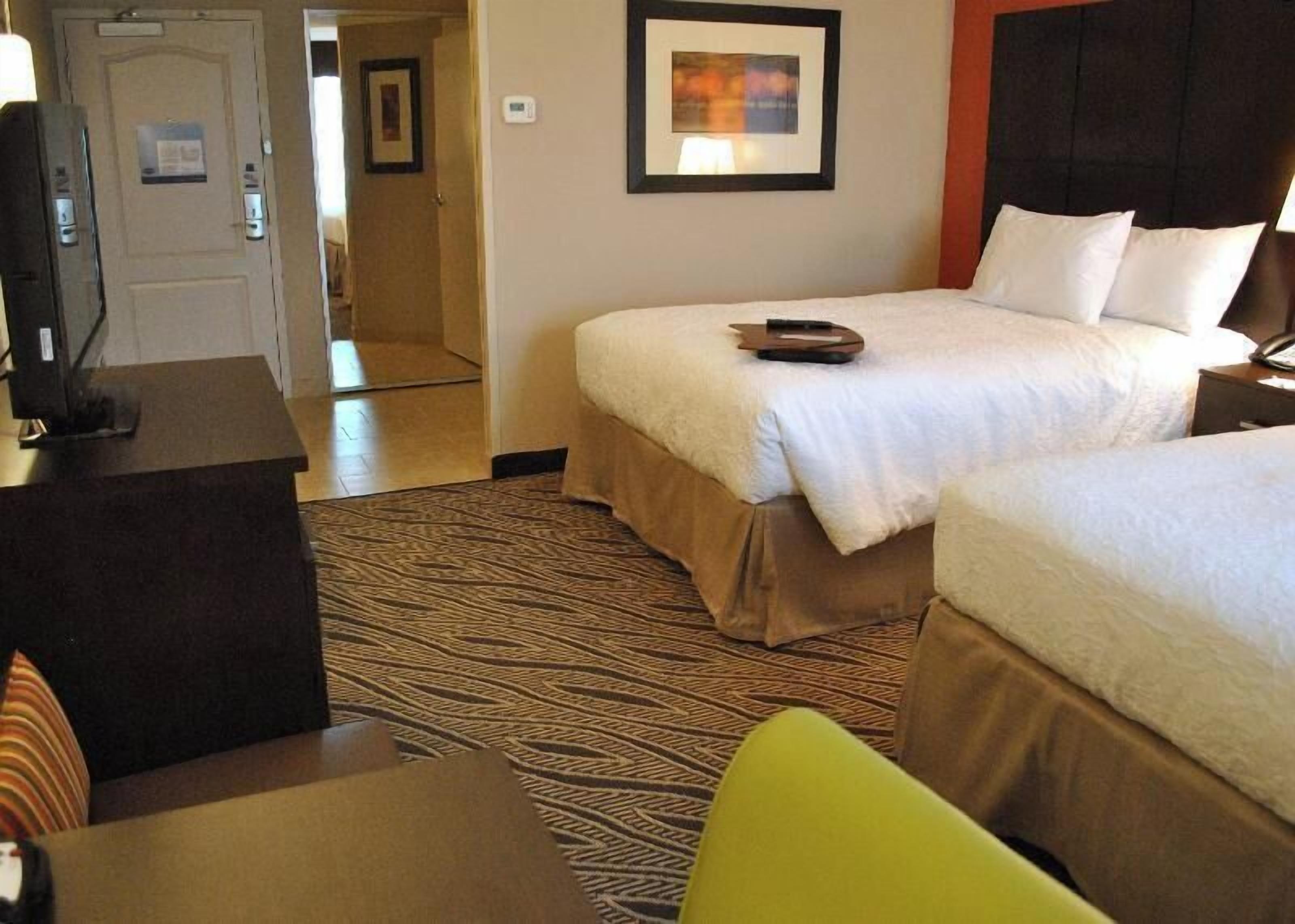 Premium bedding, pillowtop beds, desk, laptop workspace