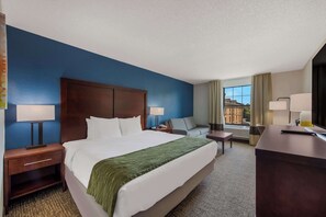 Desk, laptop workspace, blackout drapes, iron/ironing board